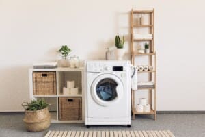 A laundry room with a washing room and toiletries